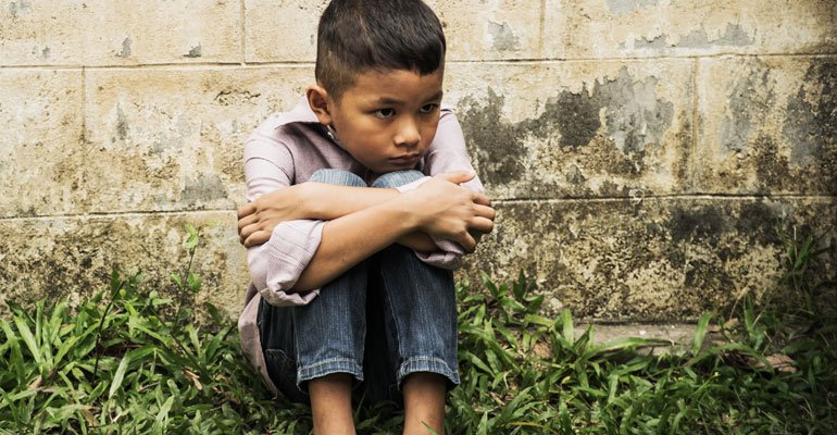 A child sitting in silence. we stand strong against any form of child abuse in india.